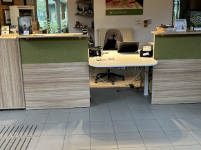 Reception desk opposite the door