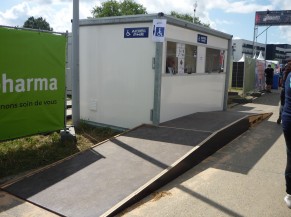 PRM reception desk with ramp, wristbands for entry